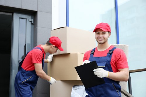 Loading household furniture into a local removal van