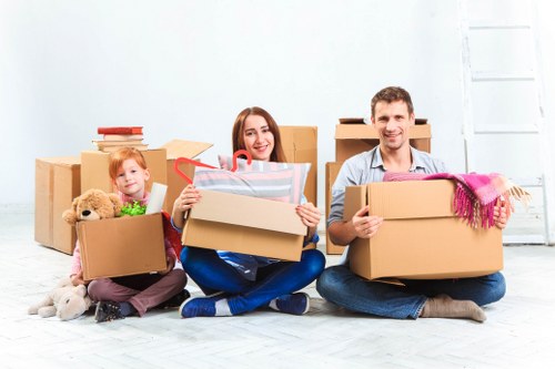 Removal team planning a house move in North Sheen with boxes and furniture