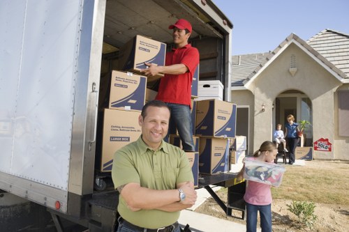 Loading furniture into a moving truck in the North Sheen area