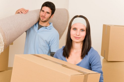 Packed boxes and furniture ready for collection in North Sheen