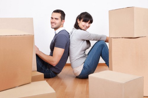 Careful loading of student belongings for a move in North Sheen