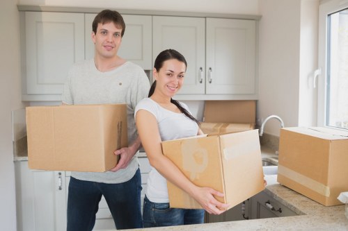 Careful loading of sofas and boxes for local furniture removals in North Sheen